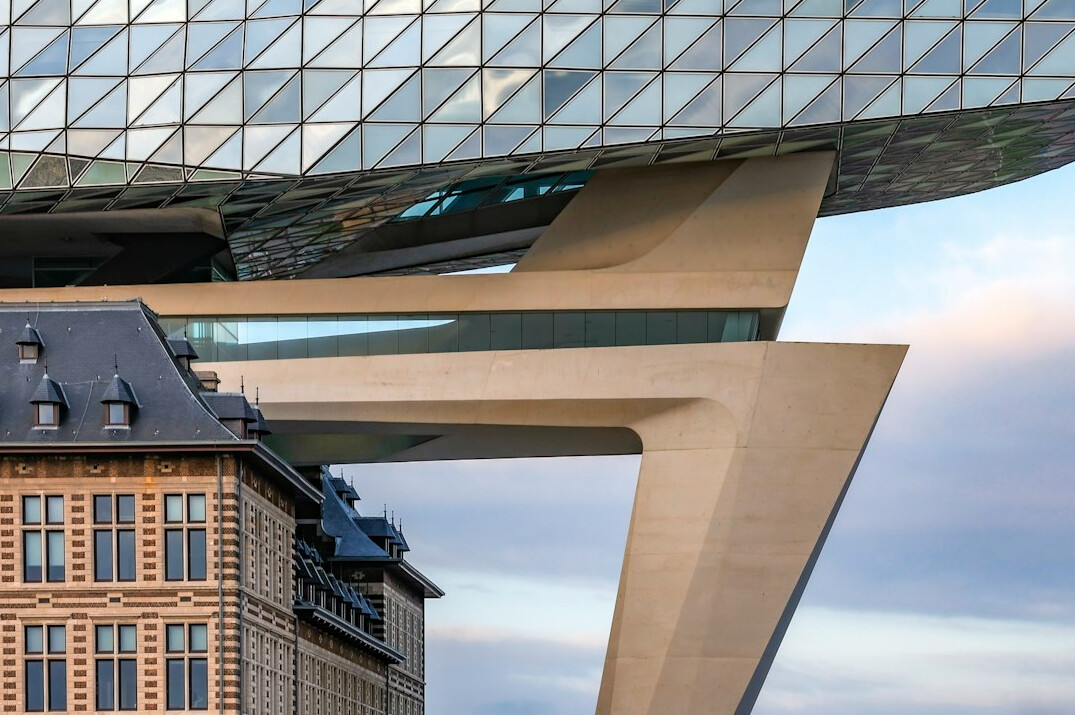 Contemporary glass office building exterior in a Belgian city